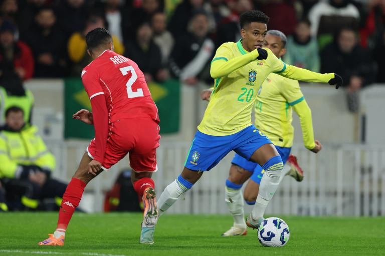 LILLE, FRANCE - NOVEMBER 18: (L-R) Ali Abdi of Tunisia, Estevao of Brazil during the International Friendly match between Brazil v Tunisia at the Stade Pierre Mauroy on November 18, 2025 in Lille France (Photo by Rico Brouwer/Soccrates/Getty Images)