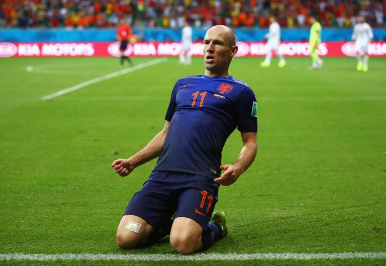 SALVADOR, BRAZIL - JUNE 13: Arjen Robben of the Netherlands celebrates after scoring a goal during the 2014 FIFA World Cup Brazil Group B match between Spain and Netherlands at Arena Fonte Nova on June 13, 2014 in Salvador, Brazil. (Photo by Alex Grimm - FIFA/FIFA via Getty Images)