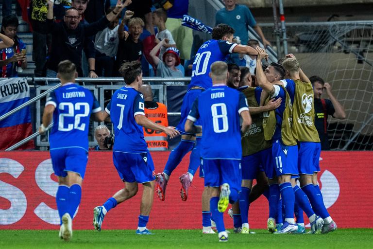 BRATISLAVA, SLOVAKIA - SEPTEMBER 4: David Strelec of Slovakia celebrate with teammates after 2nd goal during the FIFA World Cup 2026 qualifier match between Slovakia and Germany at on September 4, 2025 in Bratislava, Slovakia. (Photo by Sebastian Frej/Getty Images)