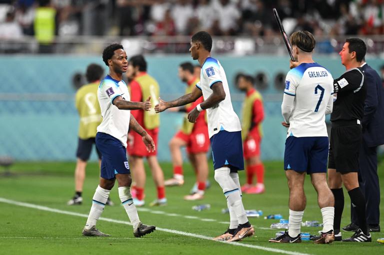 DOHA, QATAR - NOVEMBER 21: Marcus Rashford replaces Raheem Sterling of England during the FIFA World Cup Qatar 2022 Group B match between England and IR Iran at Khalifa International Stadium on November 21, 2022 in Doha, Qatar. (Photo by Matthias Hangst/Getty Images)