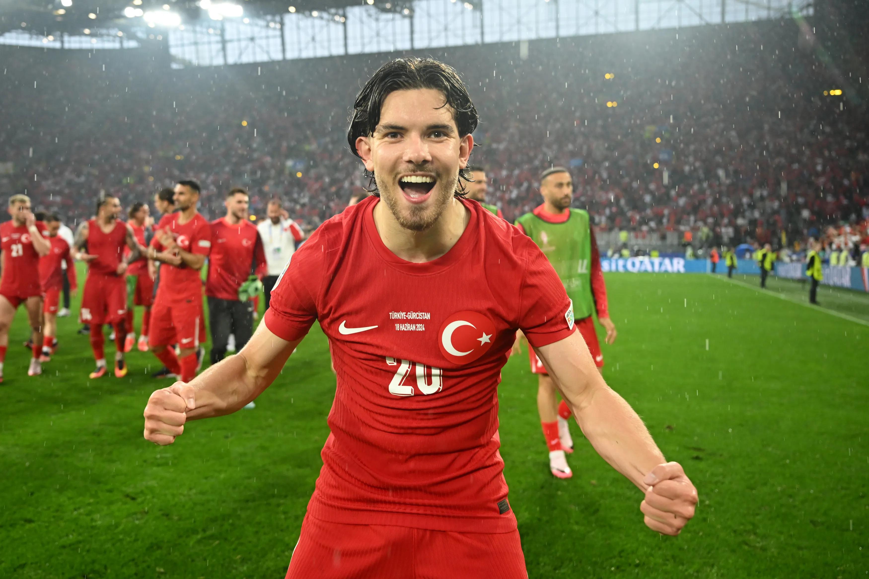 Ferdi Kadioglu celebrates Türkiye's win over Georgia DORTMUND, GERMANY - JUNE 18: Ferdi Kadioglu of Turkiye celebrates victory after the UEFA EURO 2024 group stage match between Turkiye and Georgia at Football Stadium Dortmund on June 18, 2024 in Dortmund, Germany. (Photo by Michael Regan - UEFA/UEFA via Getty Images)