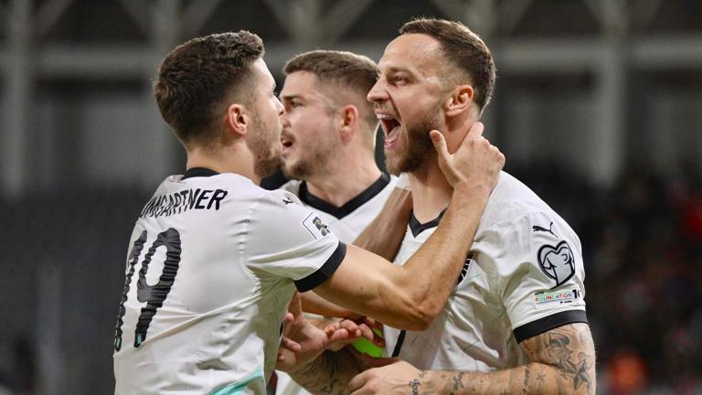 Cyprus Austria WCup Soccer Austria s Marko Arnautovic, right, celebrates with teammates after scoring a penalty, the opening goal of his team, during the World Cup 2026 group H qualifying soccer match between Cyprus and Austria, in Limassol, Cyprus, Saturday, Nov. 15, 2025 Limassol Cyprus PUBLICATIONxNOTxINxFRA Copyright: xDanilxShamkinx originalFilename:shamkin-notitle251115_np7RN.jpg