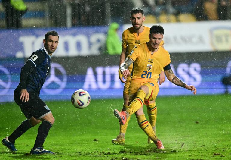 Romania's forward #20 Dennis Man scores the 3-1 during the FIFA World Cup 2026 European qualification Group H football match between Romania and San Marino, in Bucharest, on November 18, 2025. (Photo by Daniel MIHAILESCU / AFP) (Photo by DANIEL MIHAILESCU/AFP via Getty Images)