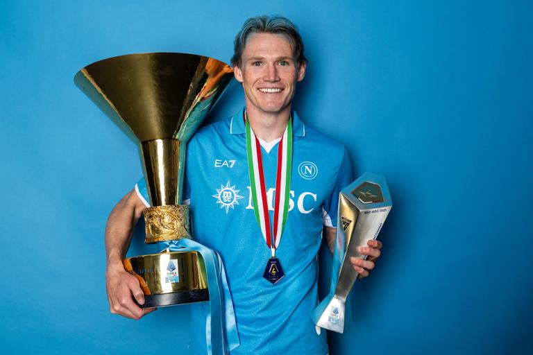 NAPLES, ITALY - MAY 24: Scott McTominay of SSC Napoli poses for a photo with the Serie A scudetto title trophy and the Serie A Season 24/25 MVP Trophy after the Serie A match between SSC Napoli and Cagliari Calcio at Stadio Diego Armando Maradona which was played on May 23rd, 2025 in Naples, Italy. (Photo by SSC NAPOLI/SSC NAPOLI via Getty Images)